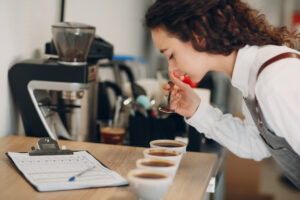 cup taster girl tasting degustation coffee quality test coffee samples cupping test taste
